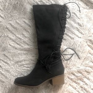 Tall black boots